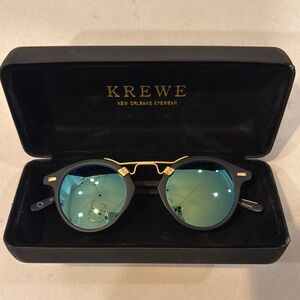 Krewe Black and Gold Sunglasses with Blue Lenses